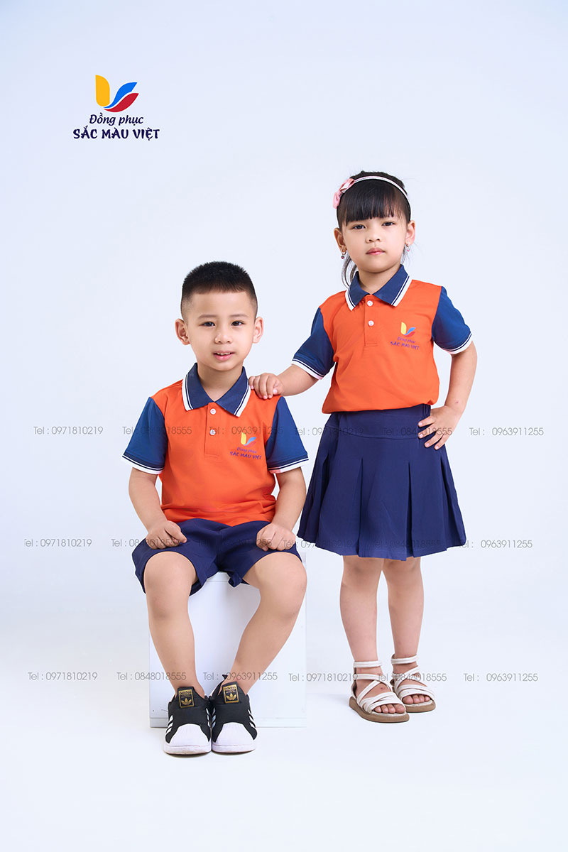 Mẫu đồng phục cam phối tay xanh than