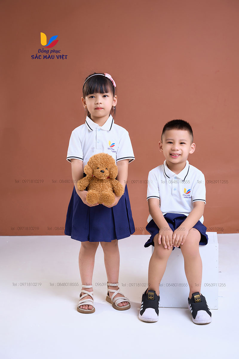 Mẫu đồng phục áo trắng,quần và váy xanh than