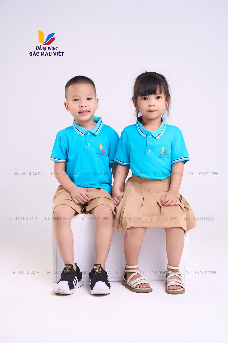 Mẫu đồng phục áo xanh YA phối quần,váy màu be